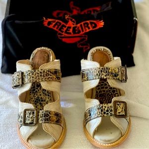 Free Bird Caprice mules.